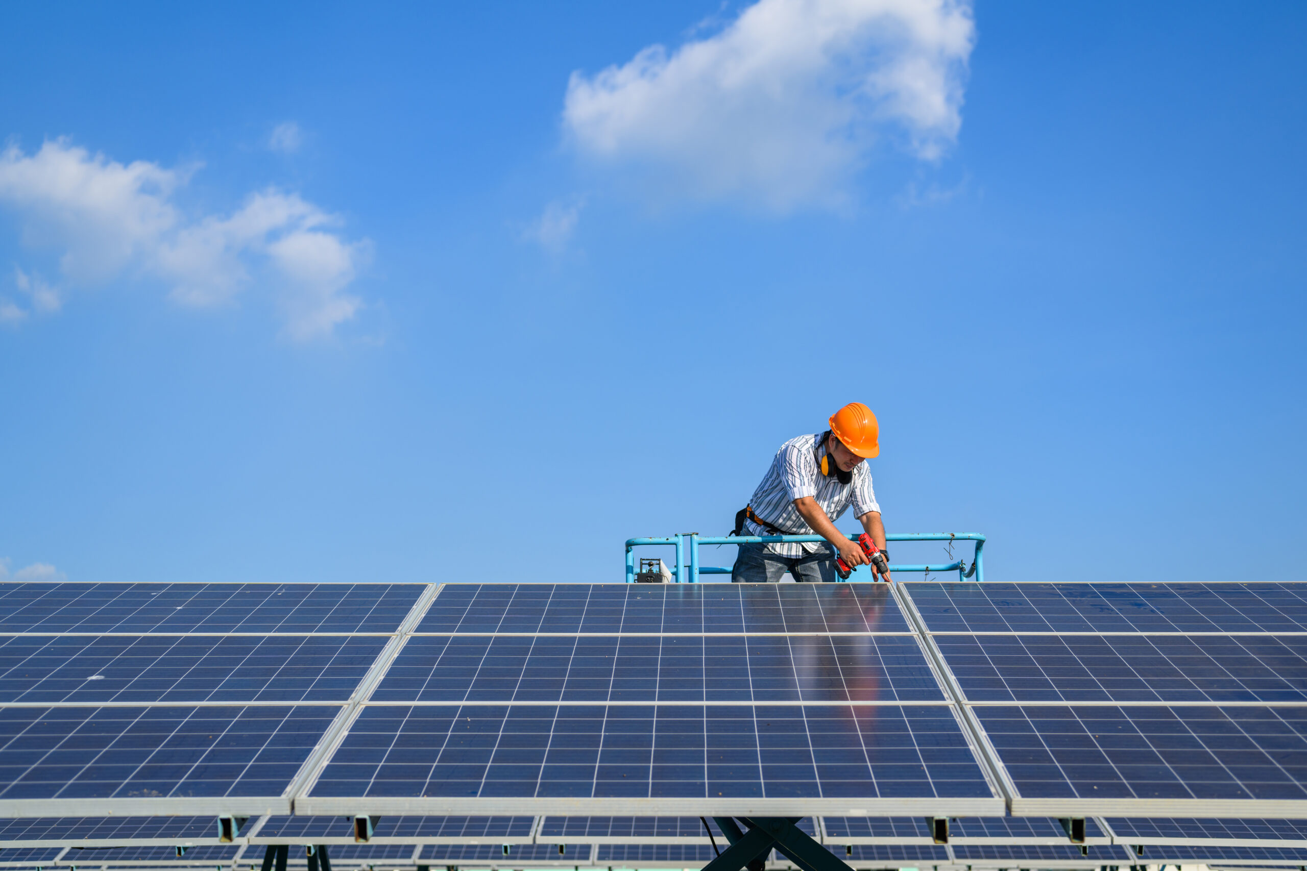 Solar panel, Worker installation Solar panel at solar energy farm field