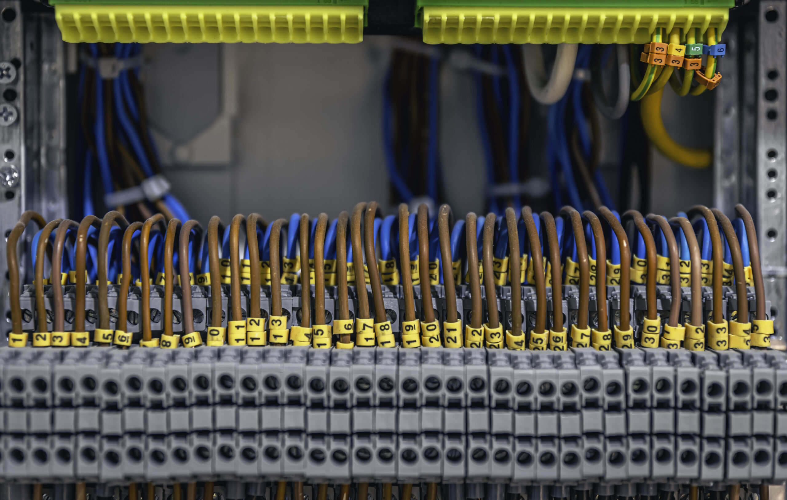 Electrical panel with fuses and contactors, close-up.